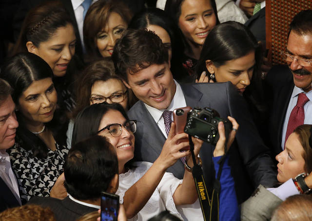 Canada PM talks wages amid NAFTA talks in Mexico