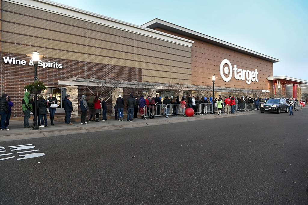 Black Friday shoppers line up outside Target before doors open at 5 p.m. local time in Maple Grove, Minnesota.