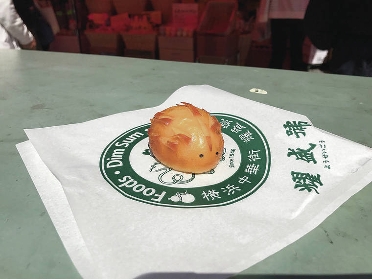 CHRIS SYKES / CSYKES@STARADVERTISER.COM
                                Youseigou, a dim sum shop, sells cute harinezumi (hedgehog). The yummy custard-filled, fried dough manju is only 100 yen!