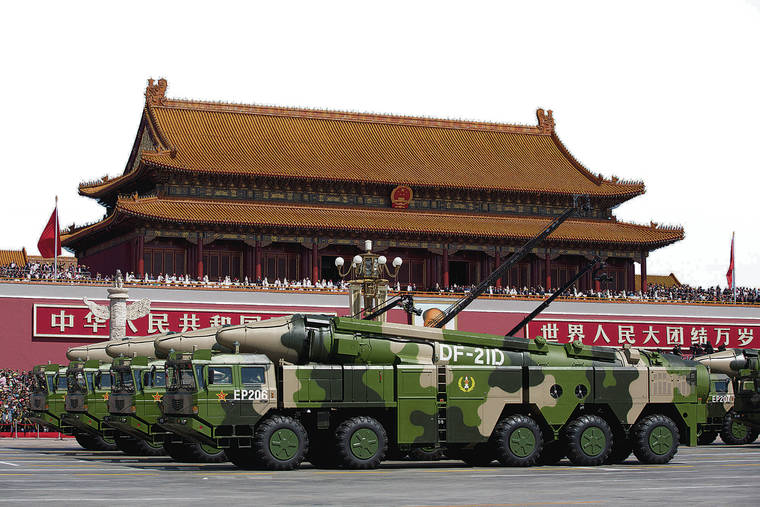 ASSOCIATED PRESS
                                Chinese military vehicles carrying DF-21D anti-ship ballistic missiles, potentially capable of sinking a U.S. Nimitz-class aircraft carrier in a single strike, drive past Tiananmen Gate during a military parade to commemorate the 70th anniversary of the end of World War II, in Beijing on Sept. 3, 2015.