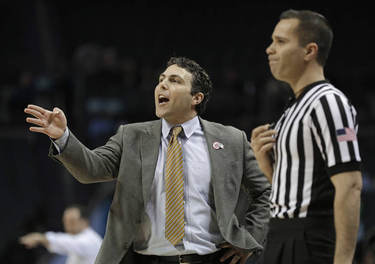 ASSOCIATED PRESS
                                Georgia Tech head coach Josh Pastner, left, directs his team against Notre Dame during the first half of an NCAA college basketball game in the Atlantic Coast Conference tournament, in Charlotte, N.C., in March. Georgia Tech’s basketball team was banned from postseason play for the upcoming season and slapped with four years of probation for major recruiting violations committed by a former assistant coach and an ex-friend of head coach Josh Pastner. The sanctions handed down by the NCAA also included a reduction in scholarships, limits on recruiting and a fine of $5,000 plus 2% of the program’s budget.