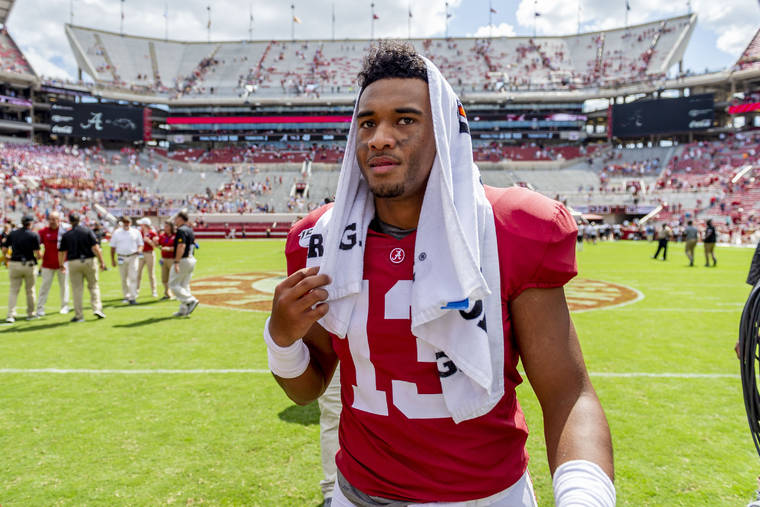 ASSOCIATED PRESS
                                Alabama quarterback Tua Tagovailoa walks off the field victorious celebrate after a 49-7 win over Southern Miss in an NCAA college football game, Saturday in Tuscaloosa, Ala.