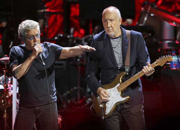 ASSOCIATED PRESS
                                Roger Daltrey and Pete Townshend with The Who performs during the Moving On! Tour at State Farm Arena in Atlanta on Sept. 18. The Who cut short a Houston concert after lead singer Daltrey lost his voice midway through the event.