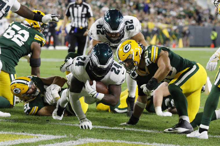 ASSOCIATED PRESS
                                Philadelphia Eagles running back Jordan Howard rushes for a touchdown during the second half of the team’s NFL football game against the Green Bay Packers today in Green Bay, Wis.
