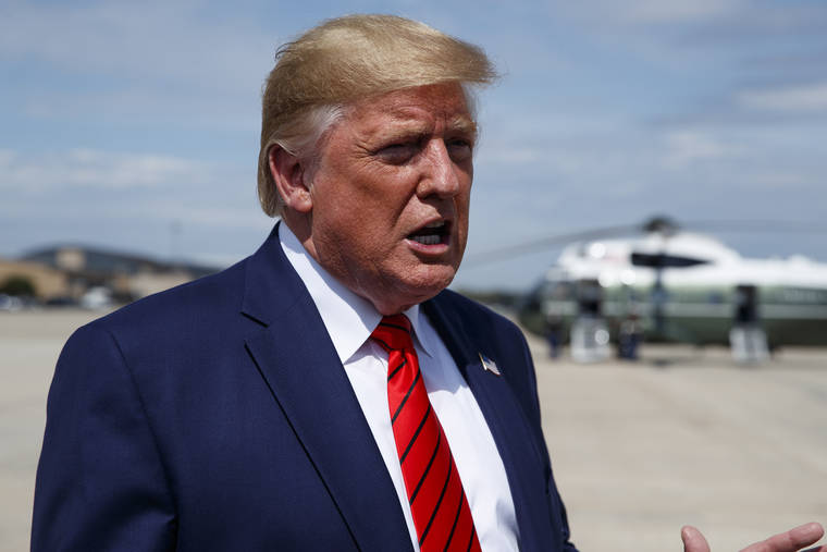 ASSOCIATED PRESS
                                President Donald Trump talked with reporters after arriving at Andrews Air Force Base, Thursday, in Andrews Air Force Base, Md.