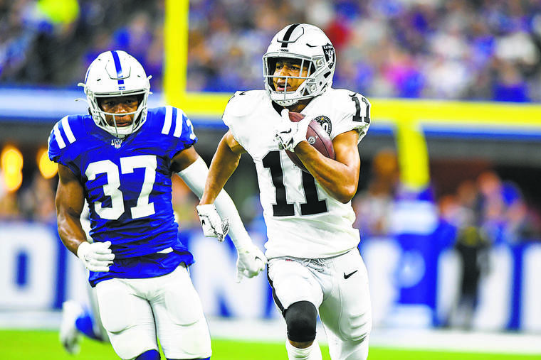 ASSOCIATED PRESS
                                Former University of Hawaii receiver Trevor Davis of the Raiders ran an end-around play 60 yards for a touchdown against the Colts.
