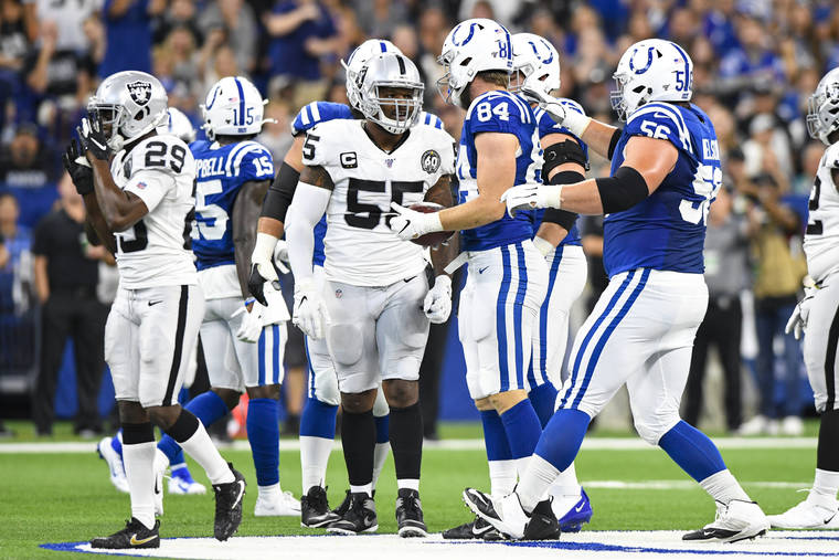 ASSOCIATED PRESS
                                Oakland Raiders outside linebacker Vontaze Burfict spoke with Indianapolis Colts tight end Jack Doyle after his helmet-to-helmet hit on Doyle during the first half of a game in Indianapolis, Sunday. Burfict has been suspended for the rest of the season for the hit.