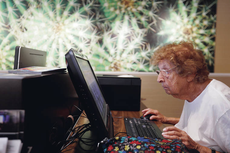 FRANCINE ORR/LOS ANGELES TIMES/TNS
                                Master swimmer Maurine Kornfeld, 97, checks her email at the hotel before heading off to compete in the USMS Spring National Championship in Mesa, Ariz., April 27, 2019. She says she doesn’t want to fall behind on her email.