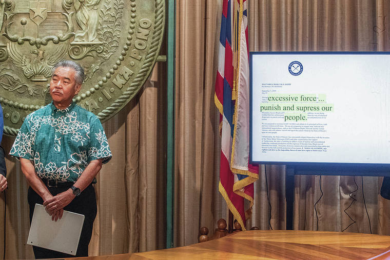 CINDY ELLEN
                  RUSSELL / CRUSSELL@STARADVERTISER.COM Gov. David Ige
                  held a news conference Friday addressing the spate of
                  social media posts about government employees,
                  officials and departments. Next to the governor is a
                  visual aid showing a post from Puuhonua o
                  Puuhuluhulu.