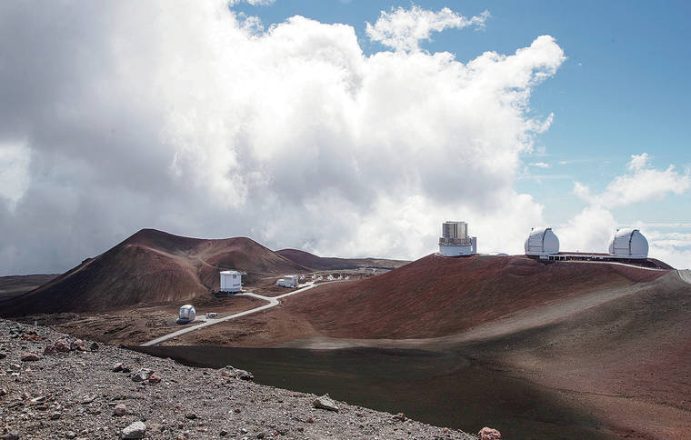 CINDY ELLEN RUSSELL / CRUSSELL@STARADVERTISER.COM
                                Telescopes dot the summit of Mauna Kea.