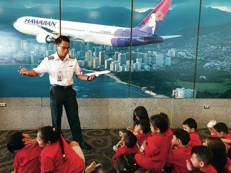 COURTESY NOLAN MADRIAGA
                                Hawaiian Airlines pilot Nolan Madriaga encourages school children visiting Hawaiian Airlines. He knew he wanted to be a pilot when he was very young.