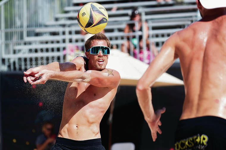 CINDY ELLEN RUSSELL / CRUSSELL@STARADVERTISER.COM
                                Taylor Crabb, from Hawaii, and Jake Gibb played against Chase Budinger and Casey Patterson on Saturday in Waikiki. Players are competing in the final stop of the Association of Volleyball Professionals tour at the Hawaii Open.