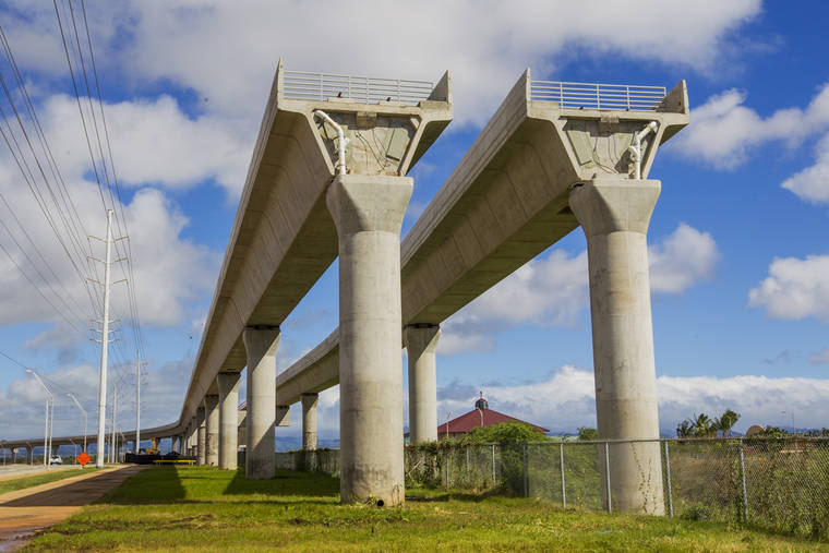 DENNIS ODA / 2016
                                HART’s mass transit rail line in East Kapolei along Kualakai Parkway. A federal review found the Honolulu rail authority apparently shortchanged 16 tenants or property owners who were relocated to make way for the city’s 20-mile rail line, and made overpayments or ineligible payments to 28 other property owners.