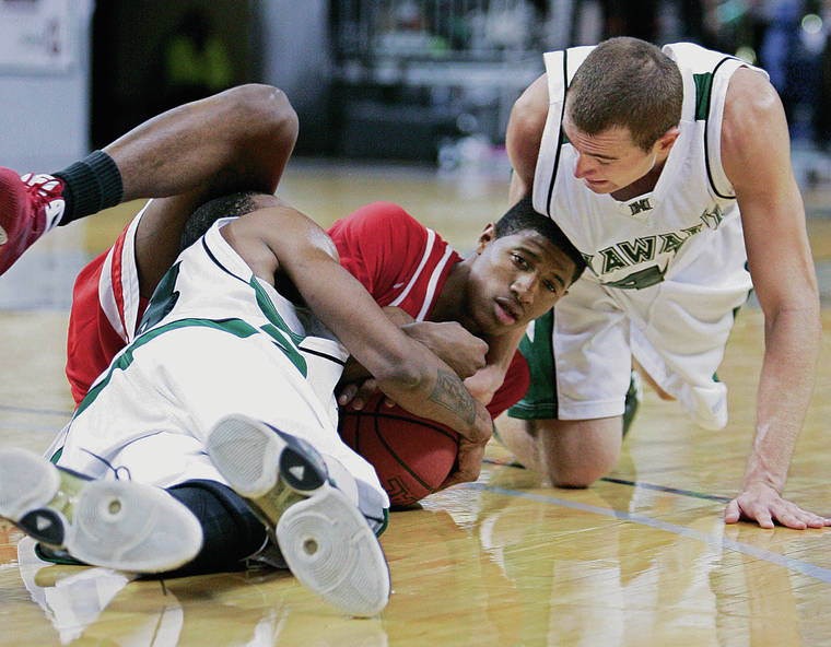RICH PEDRONCELLI / ASSOCIATED PRESS / 2009
                                Paul George, center, was on the floor when Fresno State ousted Hawaii from the WAC tournament in 2009. His Bulldogs lost to the Rainbow Warriors at the Stan Sheriff Center in his only game at the arena.