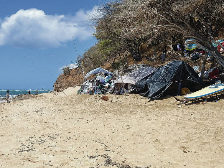 STAR-ADVERTISER
                                The city has done a sweep of Kuulei Cliffs in the area, but the encampments return. A homeless encampment is seen at a Diamond Head Beach on Aug. 22.