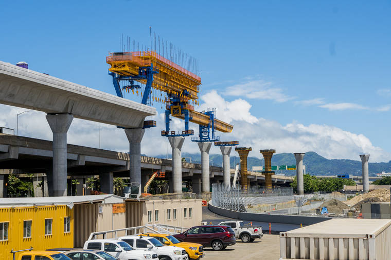 DENNIS ODA / Aug. 31
                                Construction of the HART mass transit rail line along the H-1 freeway near the Daniel K. Inouye International Airport.