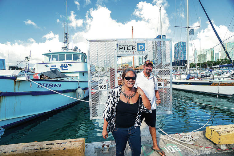 DENNIS ODA / DODA@STARADVERTISER.COM
                                Anela Maunakea, left, and Robert Rie­kina leave a new pier at Kewalo Basin. Riekena, director of operations for cultural tour boat operator Kamoauli LLC, recently moved the firm’s Polynesian catamaran, originally built in Tonga, from Waianae to Kewalo. Riekena said he’d rather be in Waianae but that Kewalo is better protected, and the new facilities are a bonus. “We have a brand-new dock, so it’s really, really nice.”