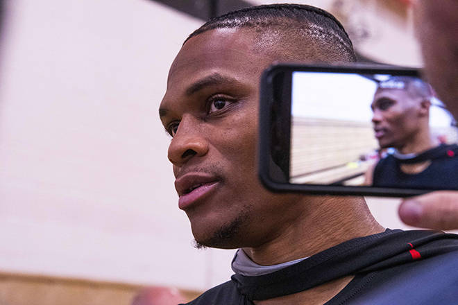 CRAIG T. KOJIMA / CKOJIMA@STARADVERTISER.COM
                                Russell Westbrook, who joined the Houston Rockets this summer, talks to reporters at the team’s practice at ‘Iolani School in Honolulu today.