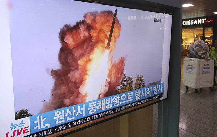ASSOCIATED PRESS
                                A TV screen showed a file image of a North Korea’s missile launch during a news program at the Seoul Railway Station in Seoul, South Korea, Wednesday. North Korea, Wednesday, fired projectiles toward its eastern sea, South Korea’s military said, in an apparent display of its expanding military capabilities ahead of planned nuclear negotiations with the United States this weekend. The sign reads: ” A projectile laugh from North Korea.”