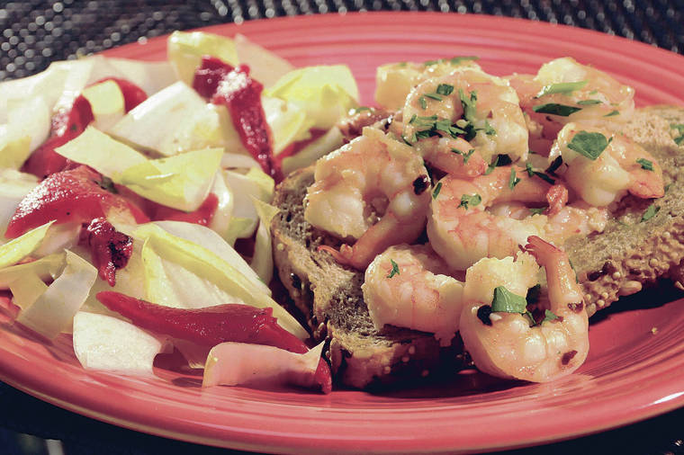 TRIBUNE NEWS SERVICE
                                Hot pepper shrimp, with roasted red pepper and endive salad.