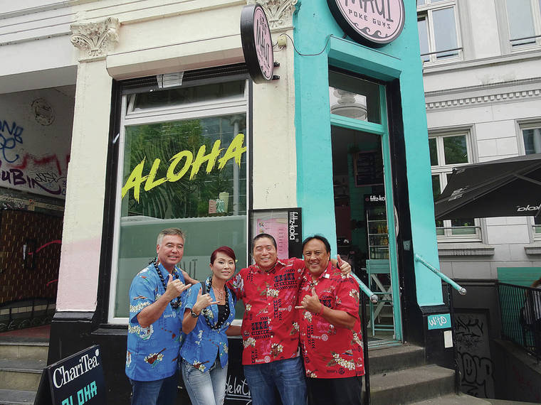 In June, Del Green, from left, Diana Doan, Laine Kohama and Ray Paler spotted Maui Poke Guys in Hamburg, Germany. They were attending the 2019 Rotary International Convention; next year’s convention will be held at the 
Hawai‘i Convention Center. Photo by a passerby.
