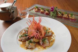 George F. Lee / 2018
                                Nobu Honolulu excels with seafood dishes, such as prawns, front, and ahi sashimi.