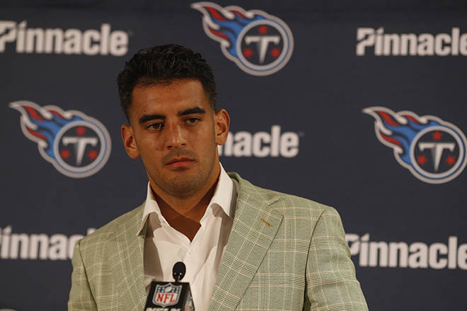 ASSOCIATED PRESS
                                Tennessee Titans quarterback Marcus Mariota speaks at a news conference after being benched during the team’s loss to the Denver Broncos Sunday in Denver.
