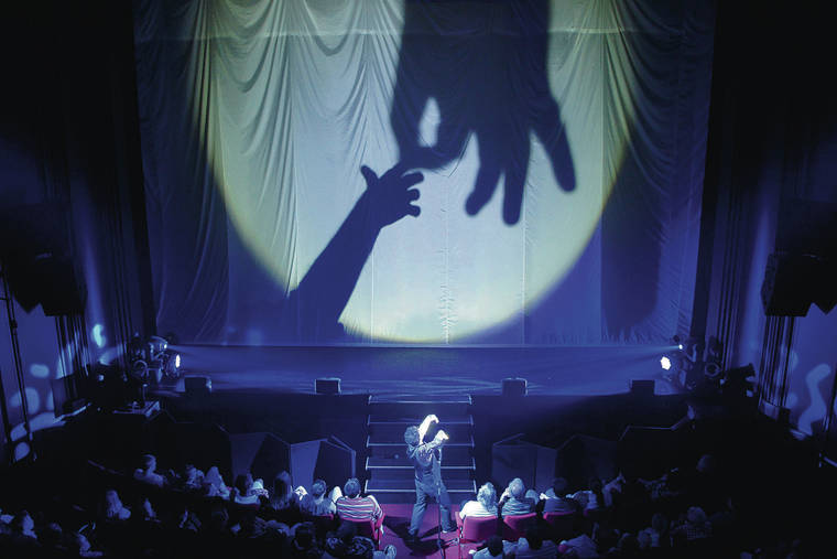COURTESY SIMON PAINTER
                                Raymond Crowe’s comedy incorporates shadow puppets.