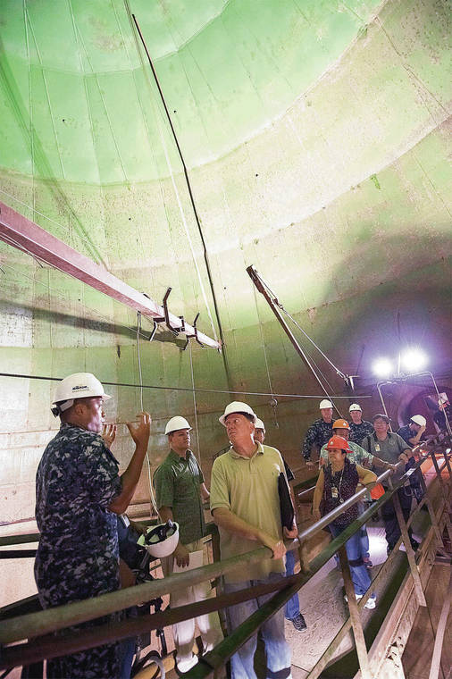U.S. NAVY / 2015
                                Members of the Honolulu Board of Water Supply visit one of the empty fuel tanks at the Red Hill Underground Fuel Storage Facility near Pearl Harbor.