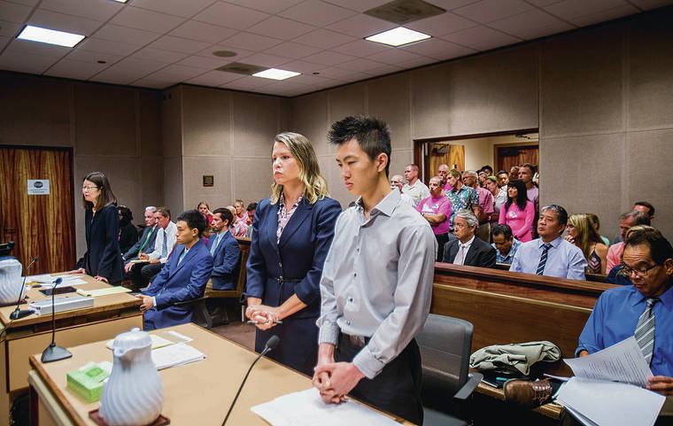 DENNIS ODA / DODA@STARADVERTISER.COM
                                Taylor Liang is pictured with his lawyer, Jacquelyn Esser, on Thursday at his sentencing in Circuit Court.