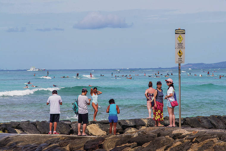 DENNIS ODA / DODA@STARADVERTISER.COM
                                Tim Garry wants to put limits on the number of surfing events in Waikiki, where the beachboys put surfing on the map. Garry said Waikiki should have limits like the North Shore, where only 16 surfing contest days per year are allowed at each beach.