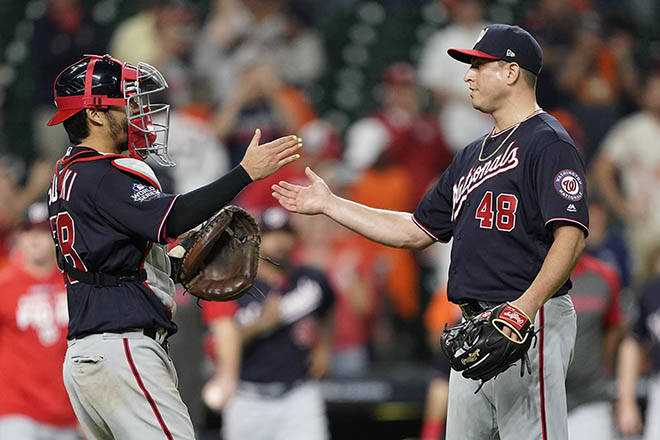 ASSOCIATED PRESS
                                Washington Nationals catcher Kurt Suzuki and relief pitcher Javy Guerra celebrate after Game 2 of the baseball World Series against the Houston Astros Wednesday in Houston. The Nationals won 12-3 to take a 2-0 lead in the series.