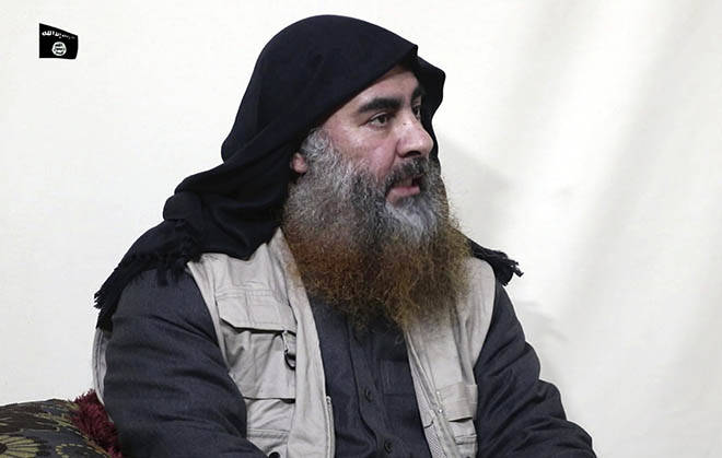 ASSOCIATED PRESS
                                This file image made from video posted on a militant website April 29 purports to show the leader of the Islamic State group, Abu Bakr al-Baghdadi, being interviewed by his group’s Al-Furqan media outlet. U.S. officials say al-Baghdadi dies during an American raid in Syria over the weekend.