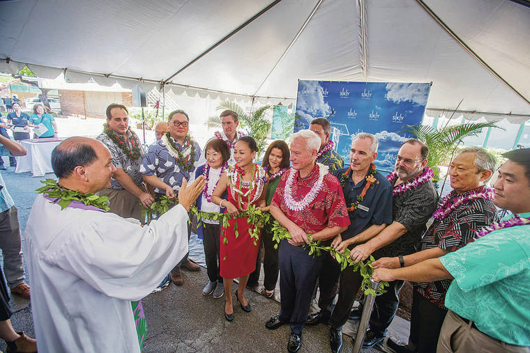 DENNIS ODA / DODA@STARADVERTISER.COM
                                A groundbreaking ceremony and blessing was held Wednesday for a combined hotel-and-condominium project named Sky Ala Moana to be developed at 1388 Kapiolani Blvd. Kumu Kordell Kekoa, front left, led the blessing.