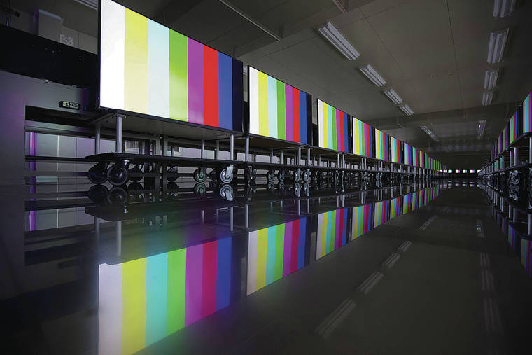 BLOOMBERG / 2015
                                Sharp Corp. Aquos liquid crystal display (LCD) televisions sit in the thermostatic aging room at the company’s plant in Yaita, Tochigi prefecture, Japan.