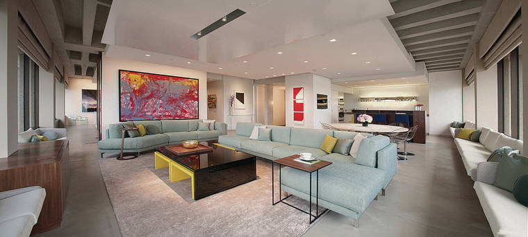 BUNSA STUDIO INTERIORS
                                A living room designed by Jennifer Bunsa uses overhead LED lighting on dimmers that can offer a soft glow or brighter light, depending on the time of day. Here, lighting the artwork played a big role in the design.