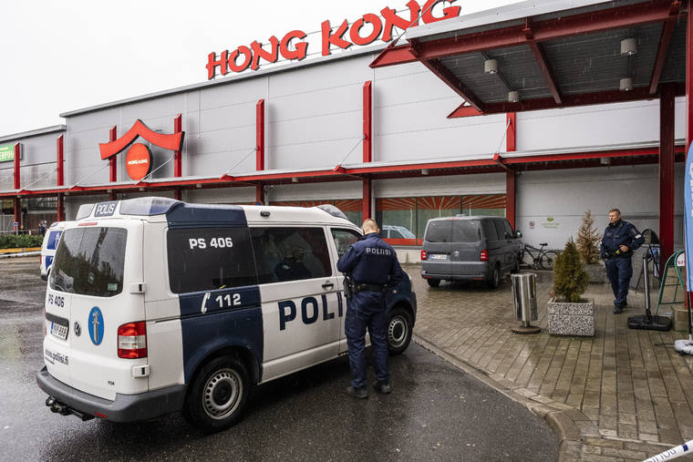 HANNU RAINAMO/LEHTIKUVA VIA ASSOCIATED PRESS
                                Police attended the scene of a violent incident at the Hermanni shopping centre in Kuopio, Finland, today. Finnish police said that one man has died in a sword attack and several others were injured at the shopping center in central Finland.