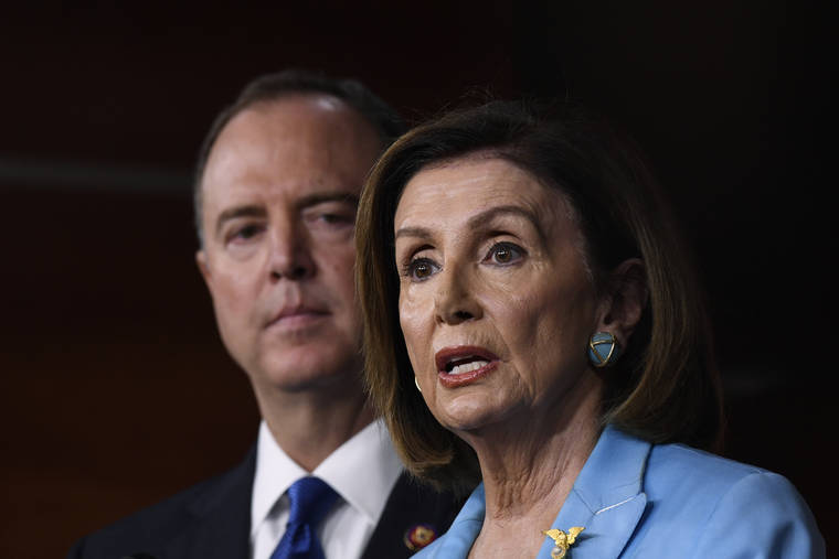 ASSOCIATED PRESS
                                House Speaker Nancy Pelosi of Calif., joined by House Intelligence Committee Chairman Rep. Adam Schiff, D-Calif., spoke during a news conference on Capitol Hill in Washington, today.