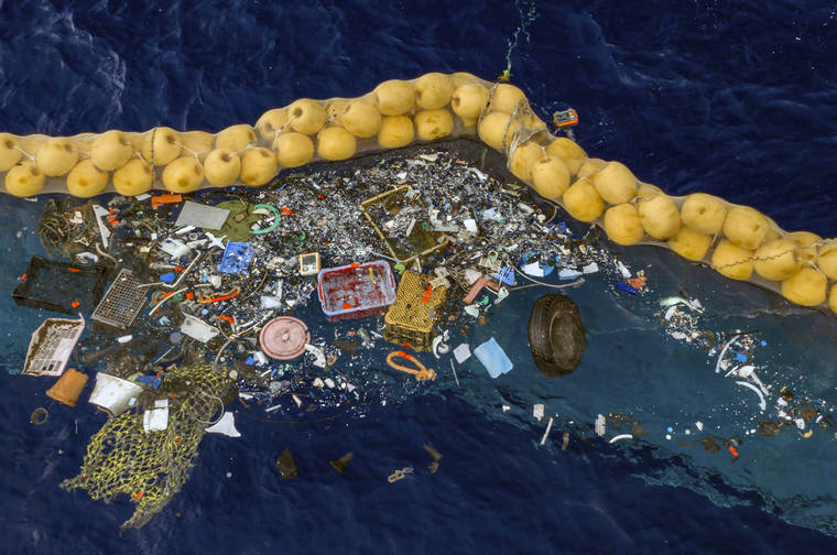 THE OCEAN CLEAN UP VIA ASSOCIATED PRESS
                                Plastic is retained in front of an extended cork line in the Pacific Ocean. A Dutch inventor says that after a series of setbacks his system for catching plastic floating in the Pacific between California and Hawaii is now working.