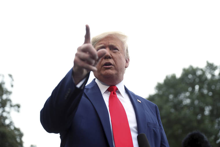 ASSOCIATED PRESS
                                President Donald Trump spoke to members of the media on the South Lawn of the White House in Washington, today, before boarding Marine One for a short trip to Andrews Air Force Base, Md., and then on to Florida.