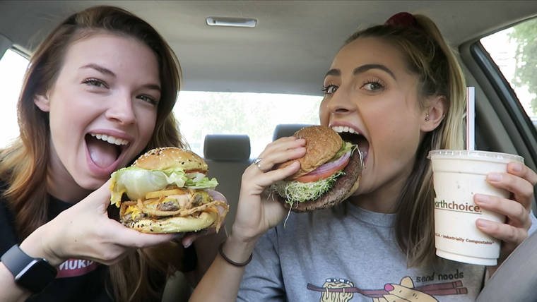 BRITTANY MARSICEK VIA ASSOCIATED PRESS
                                Dancer-actor Brittany Marsicek, 28, left, and actor Chantal Plamondon, 27, during the filming of their Mukbang Monday channel. The two focus on vegan food, reviewing the latest fast-food offerings, and often film in their cars as they chat about auditions and day jobs while munching from fast-food containers.