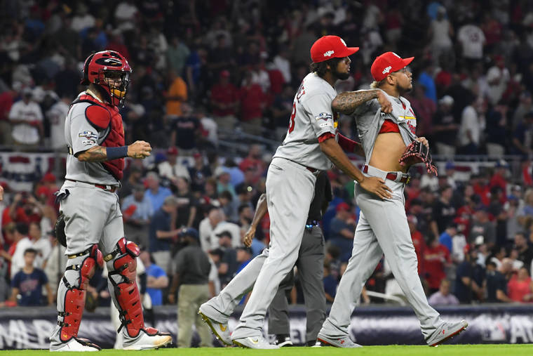 Cardinals score 4 in 9th, hold off Braves 7-6 in NLDS opener | Honolulu Star-Advertiser