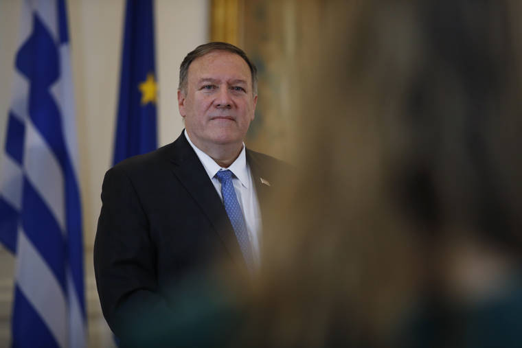 ASSOCIATE PRESS
                                U.S. Secretary of State Mike Pompeo listens to a reporter’s question, during a joint news conference with Greek Foreign Minister Nikos Dendias, following their meeting in Athens today.