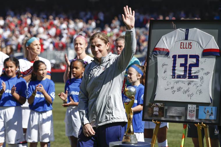 ASSOCIATED PRESS
                                United States head coach Jill Ellis waves to the crowd as she is honored during a ceremony before an international friendly soccer match against South Korea, today in Chicago.