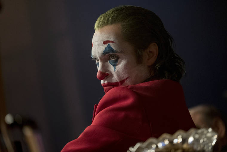 COURTESY WARNER BROS.
                                Joaquin Phoenix in a scene from the film “Joker.”