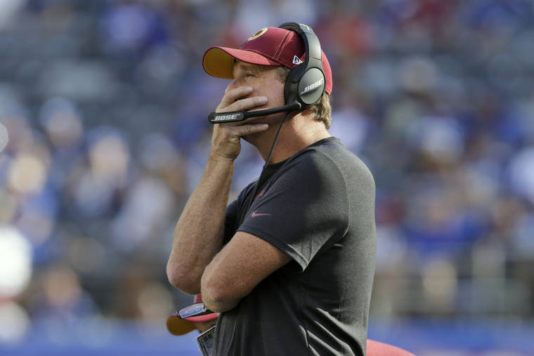 ASSOCIATED PRESS
                                Washington Redskins head coach Jay Gruden watched the game against the New York Giants, Sept. 29, during the second half of a game, in East Rutherford, N.J. The Giants defeated the Redskins 24-3.