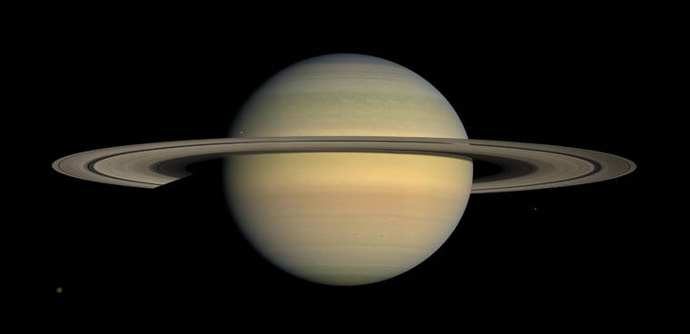 ASSOCIATED PRESS
                                This July 23, 2008 file image made available by NASA shows the planet Saturn, as seen from the Cassini spacecraft. Twenty new moons have been found around Saturn, giving the ringed planet a total of 82, scientists said today.