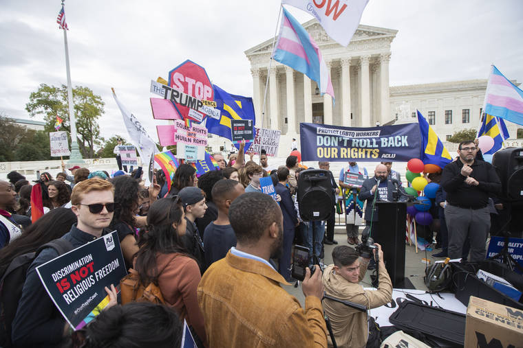 ASSOCIATED PRESS
                                LGBT supporters gathered in front of the U.S. Supreme Court, today, in Washington. The Supreme Court is set to hear arguments in its first cases on LGBT rights since the retirement of Justice Anthony Kennedy.