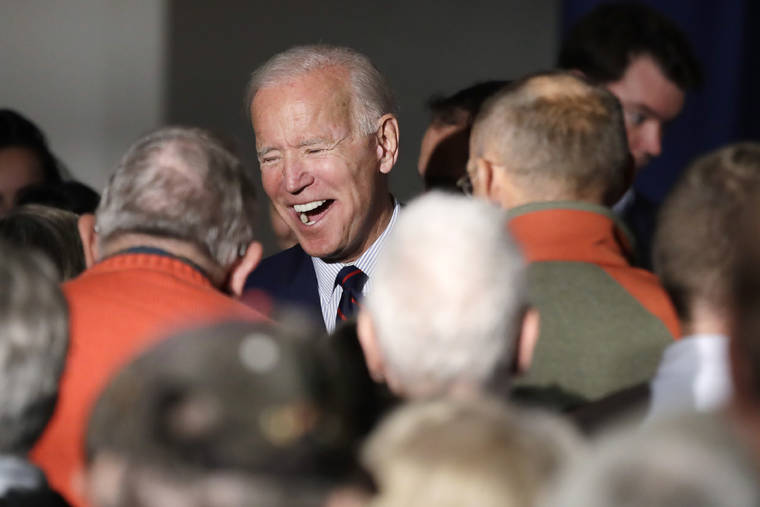 ASSOCIATED PRESS
                                Democratic presidential candidate and former Vice President Joe Biden laughs with people at a campaign event in Rochester, N.H.