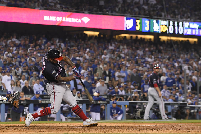 ASSOCIATED PRESS
                                Washington Nationals’ Howie Kendrick hits a grand slam against the Los Angeles Dodgers during the 10th inning in Game 5 of a baseball National League Division Series today in Los Angeles.